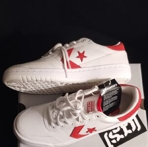 Converse White Sneakers with Red Star Accents